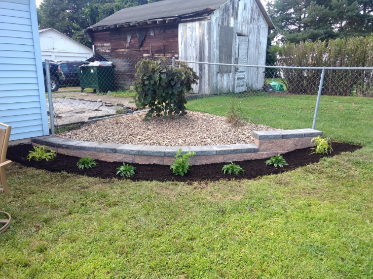 A newly installed landscaping job with bricks